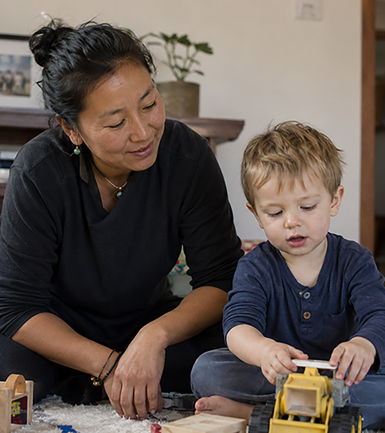 Professional Tibetan caregiver with a family
